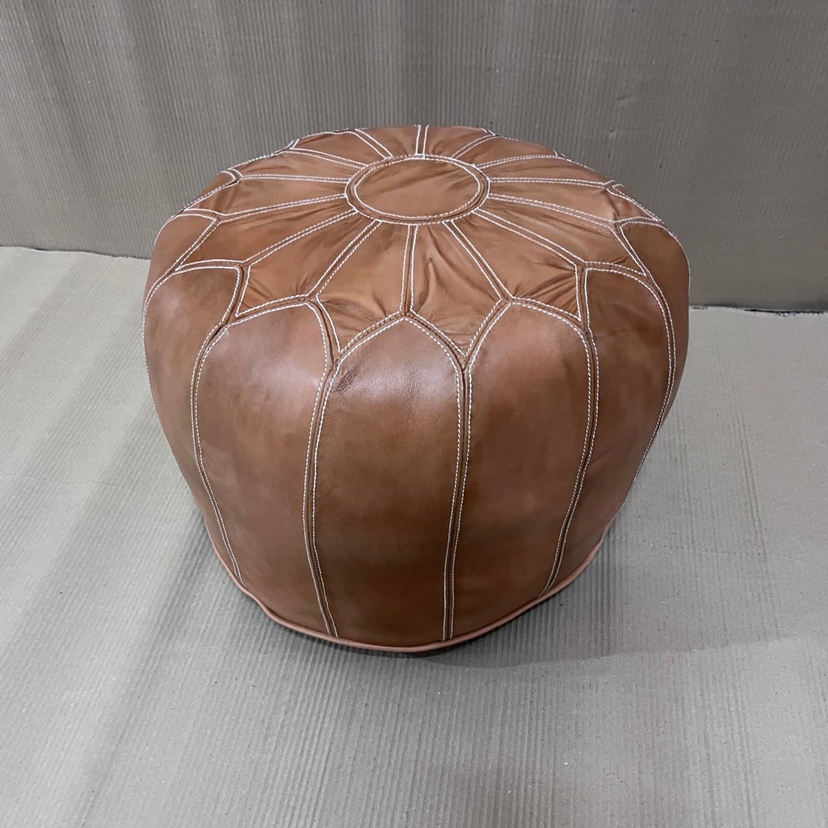 Dakota Brown leather round ottoman - Rustic Furniture Outlet