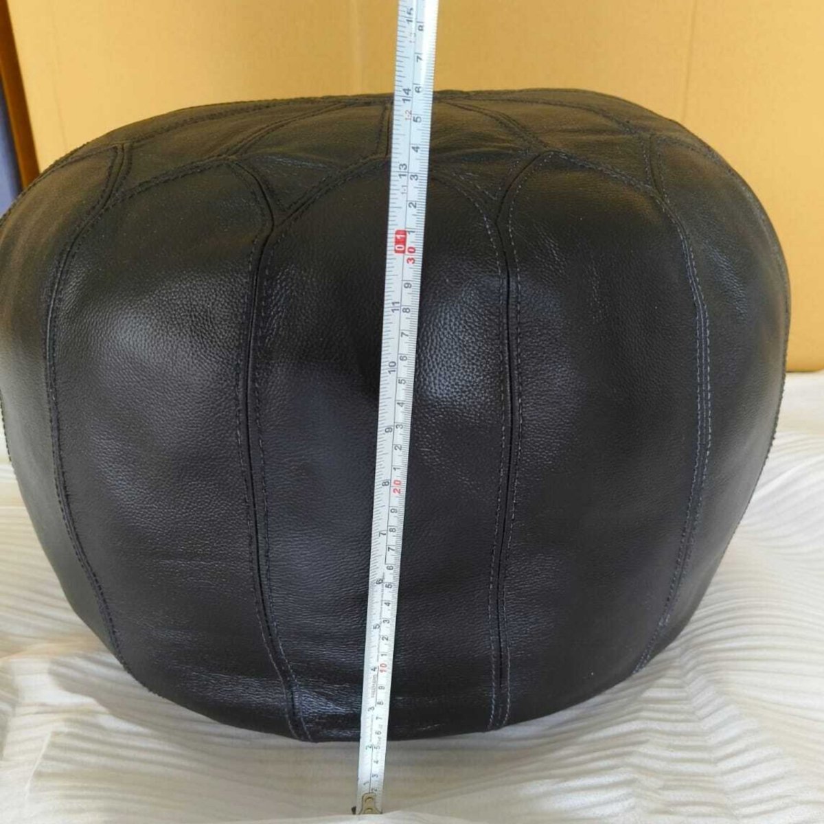 Dakota Black leather round ottoman - Rustic Furniture Outlet