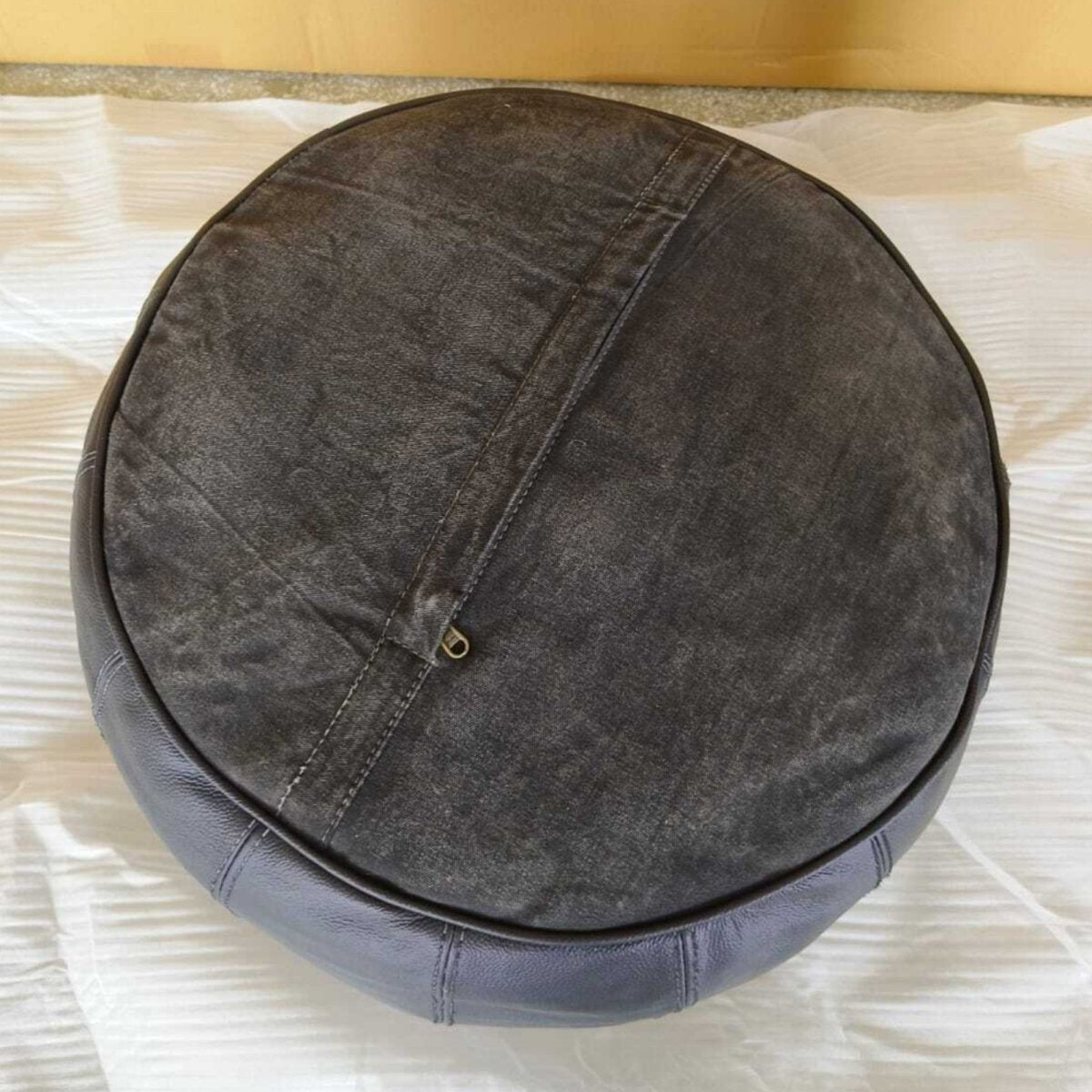 Dakota Black leather round ottoman - Rustic Furniture Outlet
