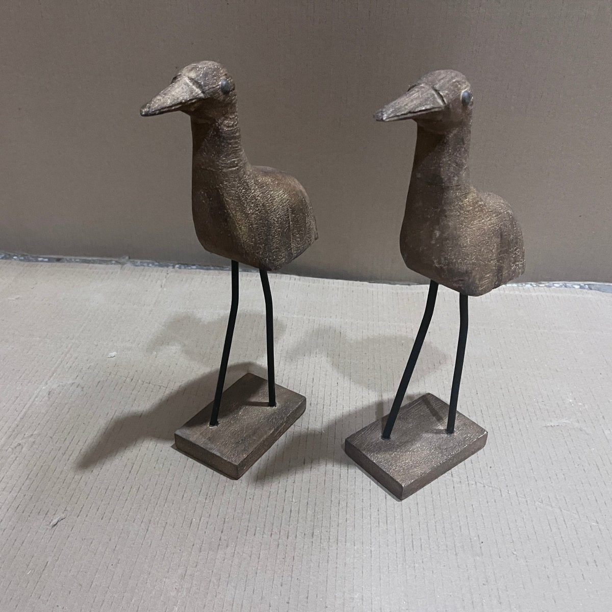 Decorative standing wooden bird with metal legs - Rustic Furniture Outlet