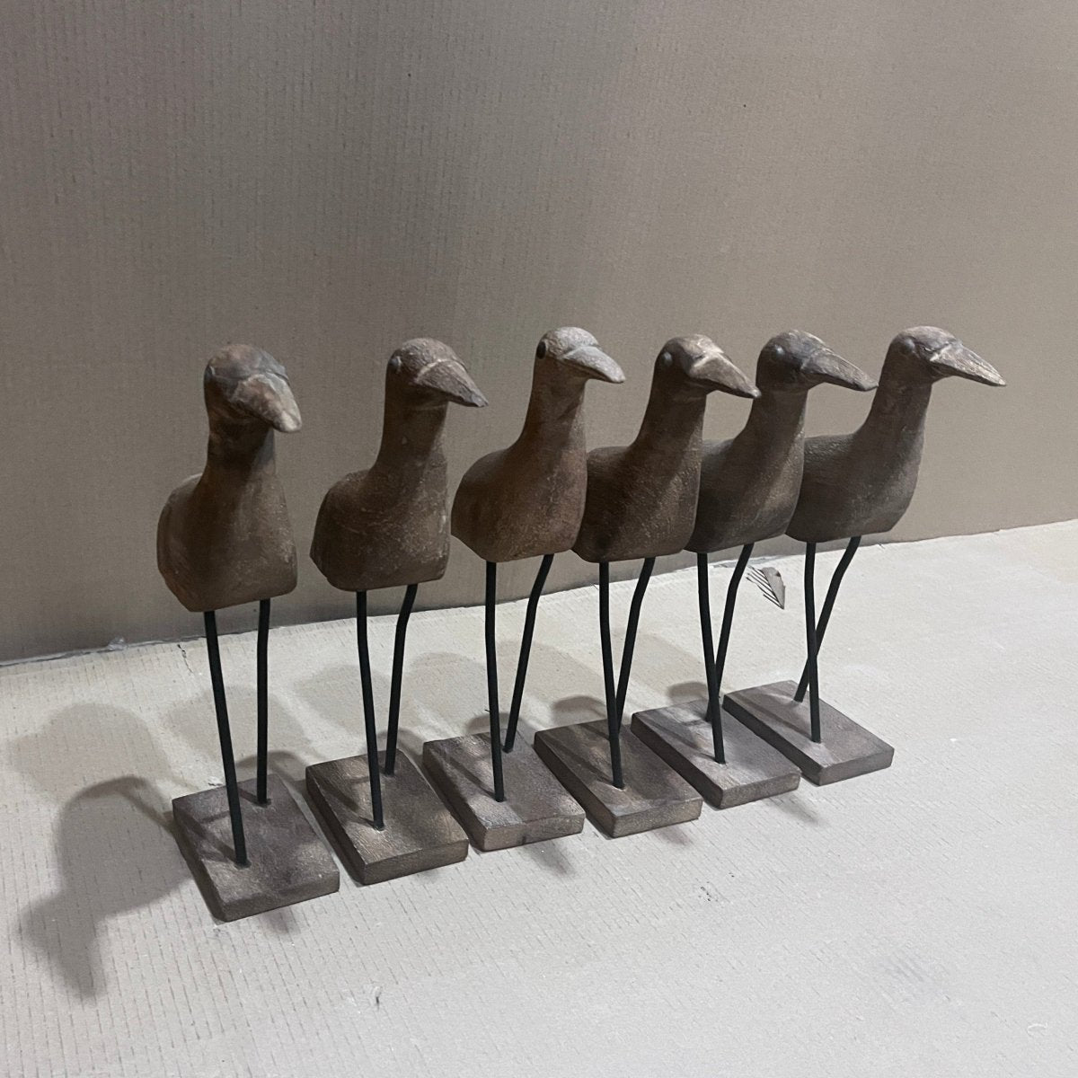 Decorative standing wooden bird with metal legs - Rustic Furniture Outlet