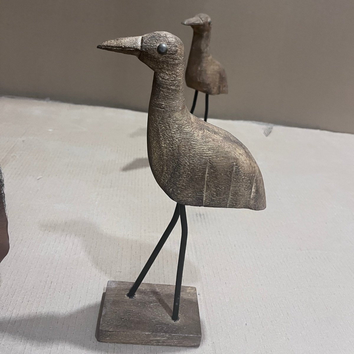 Decorative standing wooden bird with metal legs - Rustic Furniture Outlet